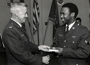 Dean Willis receiving his assignment to the US Air Force