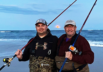 charlie and hunter durrer fishing at the beach