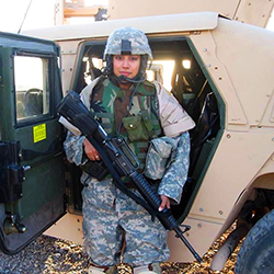Maria Terry, Employee Relations Consultant, in Army combat fatigues