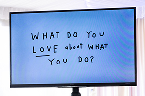 sign with words "what do you love about what you do?"